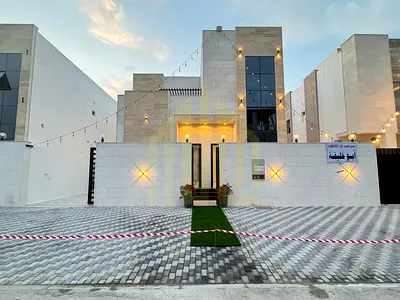 Own your dream two-story villa, including registration fees, in Al Helio 2 area, on Sheikh Mohammed Bin Zayed Road. Super deluxe finishing, directly f