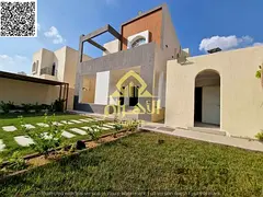 Luxury super deluxe corner villa for sale in Al Muwaihat 1, Ajman, with an annex and includes elect