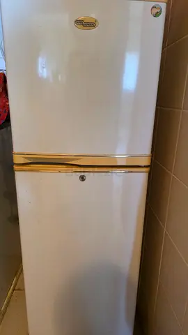 Used double-door refrigerator freezer - working condition