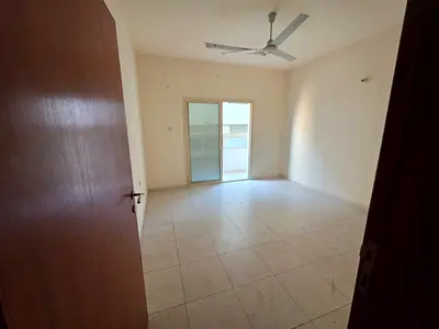 Two-bedroom apartment with a living room, excellent size, Al Hamidiya 1, next to the courthouse, prime location, easy access to Sharjah and Dubai
