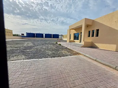 Industrial land in AJMAN with boundary walls and office for rent