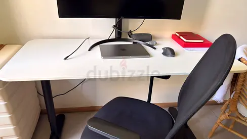 Simple white office desk with ergonomic black chair - good condition