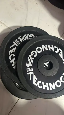 Set of Technogym 2.5kg Rubber Weight Plates (Pair) - Good Condition