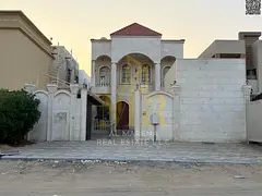 Villa for sale in Al Muwaihat 1, on a main street, residential/commercial, two floors and a roof. Pr