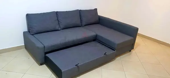 IKEA L shap Sofa store cum bed you can fix the storage lift or Right