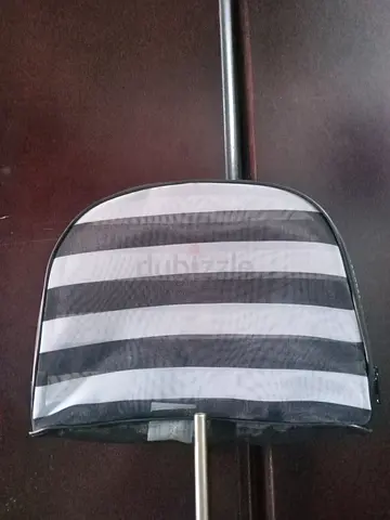 Striped small travel cosmetic pouch — light used, good condition