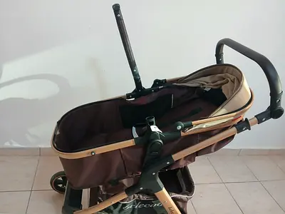 Gold frame bassinet stroller - full bassinet carrycot included