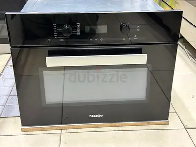 Miele built in microwave series 6000 in excellent condition black