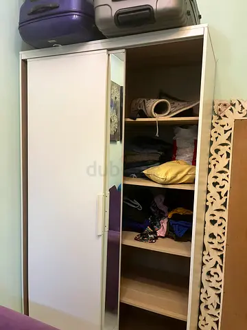 White wooden shoe cabinet with storage compartments