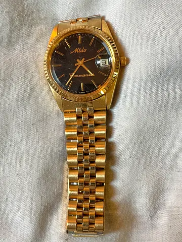 Swiss  Mido  Wristwatch with rare black dial .