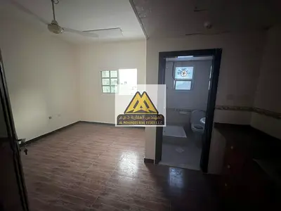A studio for annual rent in Al Rashidiya 1 – Ajman, featuring a spacious layout and central air conditioning, located in a family-only building in a l
