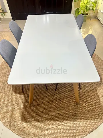 White Scandinavian Dining Table with 4 Grey Chairs, home center, in a good condition