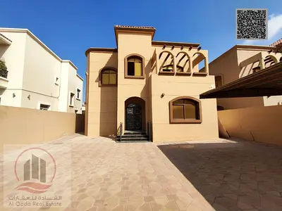 Villa for sale in Ajman, Al Muwaihat area. 5 master bedrooms, living room, majlis, and maid's room.