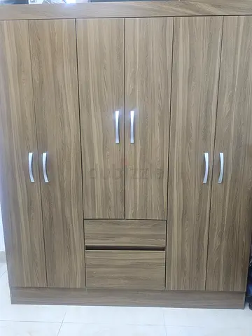 3-Door Wooden Wardrobe with Drawers - Good Condition..