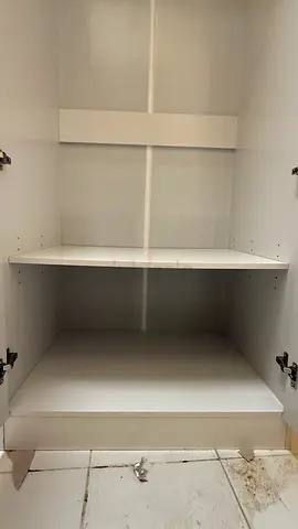 White kitchen/storage cabinet with shelves - good condition