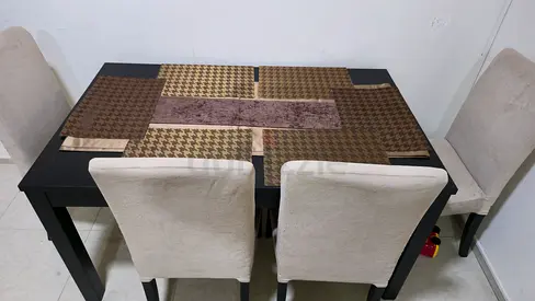 Ikea bjursta extendable dining table black with 4 chairs for sale