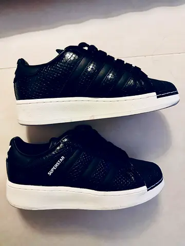 Black Adidas Superstar XLG sneakers with gold accents - used, size 42