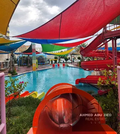 Swimming Pool | Gym | Free Parking | Aqua Park | Kids Area | Luxury One Bedroom and Living Room Apa