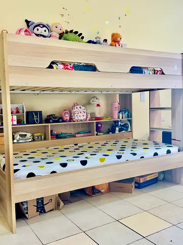 Light wood bunk bed with built-in shelves - good condition with mattresses