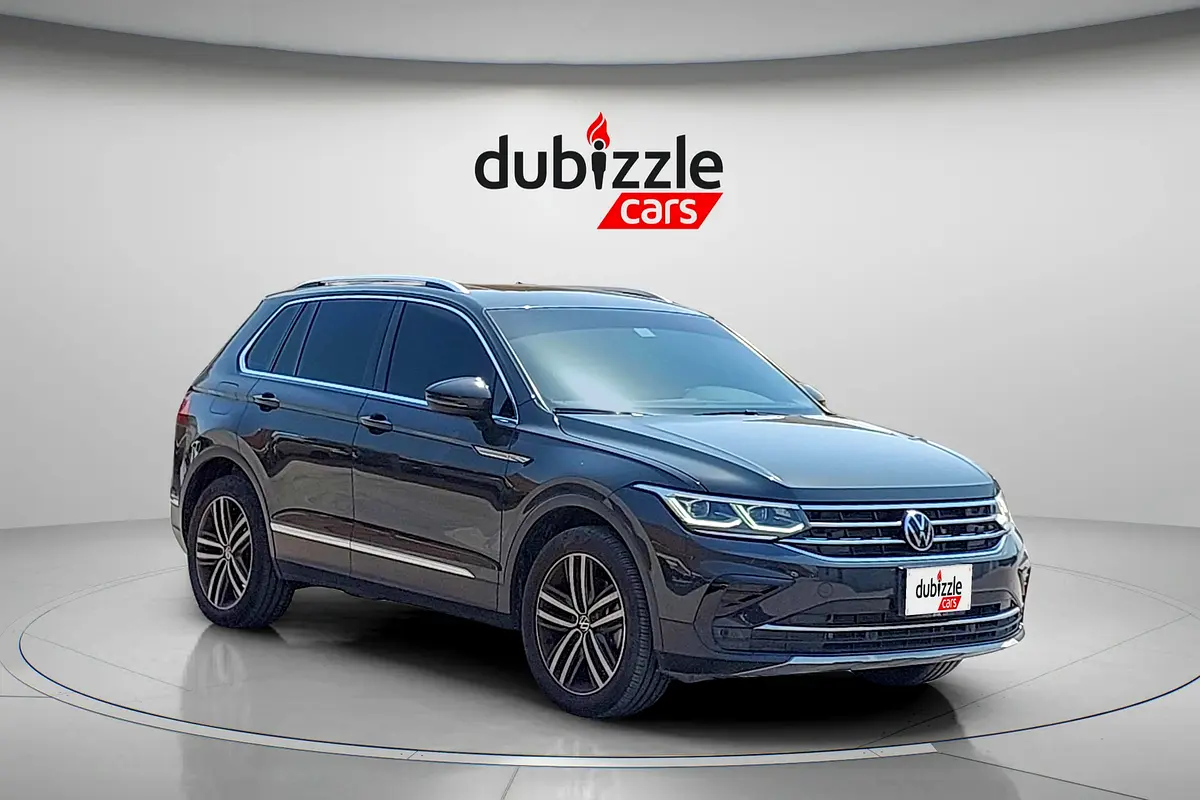 Volkswagen Tiguan 2024 — photo 1 of 15