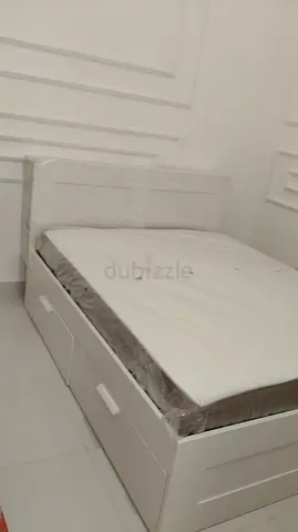 Ikea Brimnes bed with storage drawers and mattress - good condition