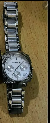 Silver-tone BCBG wristwatch with metal bracelet - used