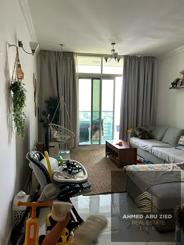 Own a luxurious two-bedroom apartment in Al Waha Towers with a down payment of only 250,000 AED. Features include a gym, parking, swimming pool,