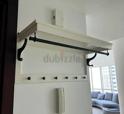 Wall-mounted wooden coat rack with shelf and hanging rail - White