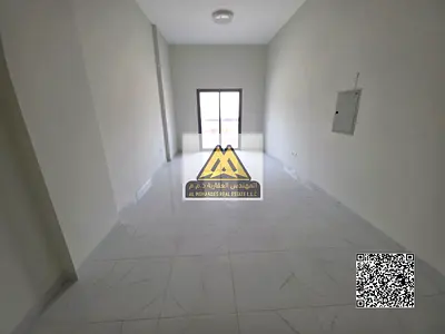 Two-bedroom apartment for annual rent in Al Jurf Industrial 3 – Ajman, spacious unit with open view.