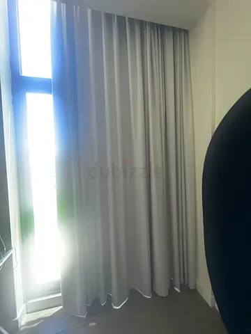 White-grey curtains for Windows around 1m70