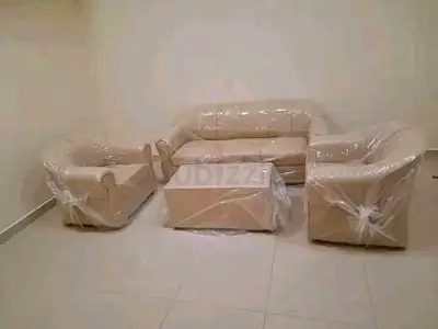 3-piece beige leather sofa set with coffee table (like new)