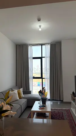 Modern grey living room sofa that can be turned to a sofa bed