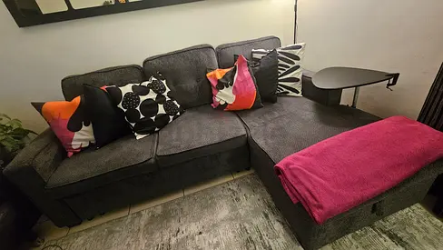Comfortable L-shaped grey fabric sofa with chaise (good condition)