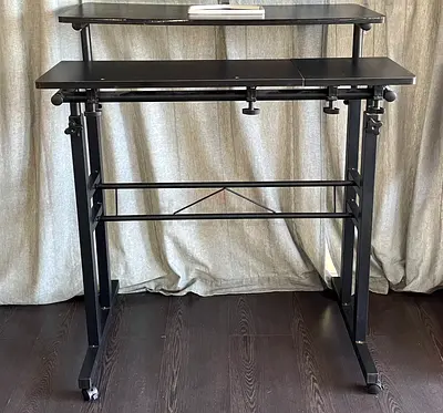 Black adjustable computer desk (good condition, NEGOTIABLE)