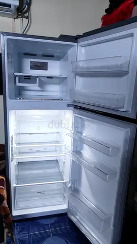 Used double-door refrigerator in good working condition