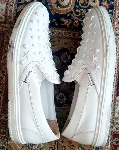 White Jimmy Choo Slip-on Sneakers With Star Studs. Preloved. Size 43EU 9UK. AED 990 Only.
