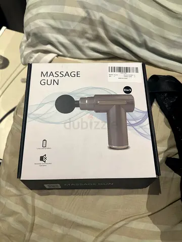 Brand new massage gun in sealed box - used once still in great condition
