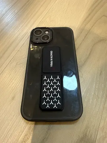 iPhone 15 with case and VIVA Madrid phone , good condition.