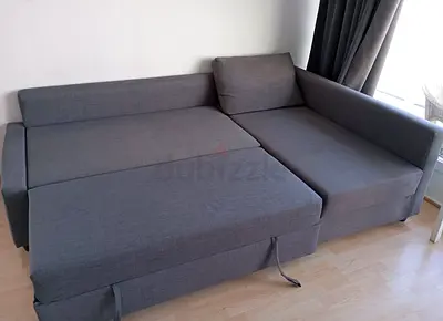Grey L-shaped Sofa Bed (pull-out) - good condition