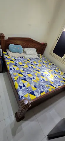 Solid wooden double bed with mattress - good condition