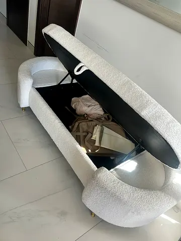 Cream upholstered storage bench/ottoman — good condition