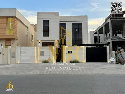 Super modern villa in Al Helio, two floors and a roof, 4 bedrooms, at a special price A luxurious super modern villa for sale in Al Helio area, Ajman