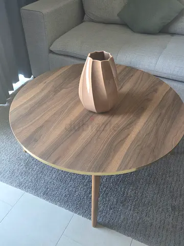 Round wooden side table with brass trim - good condition