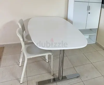 White Oval Dining Table with Chrome Base (Seats 4) - Good Condition