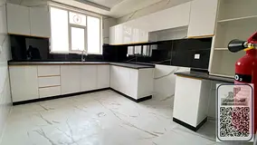Two bedrooms, a living room, three bathrooms, a balcony with a view of Al Muwaihat 2, central air co