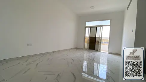 Two bedrooms, a living room, three bathrooms, a balcony with a view of Al Muwaihat 2, central air conditioning, a new building, free parking, paved ro