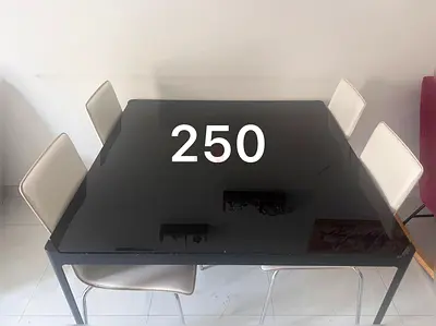 Black Glass Top Dining Table with 4 White Chairs - Good Condition