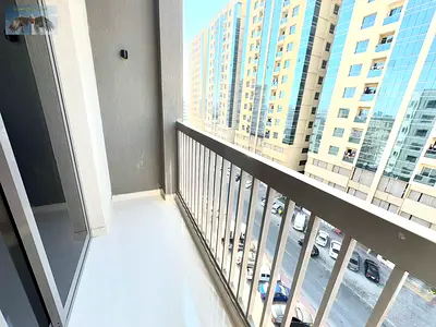 Two-bedroom apartment with a living room for annual rent in Al Hamidiya, Ajman, next to Garden City Towers and close to the courthouse and Etisalat. E