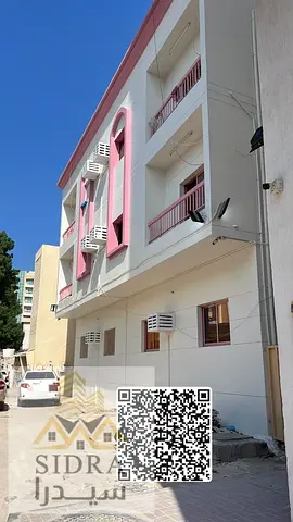 Investment building for sale in Al Rumaila 1, Ajman | 16 apartments | Prime location near Ajman Cor