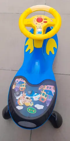 Blue and Yellow Ride-On Wiggle Car for Toddlers - Good Condition